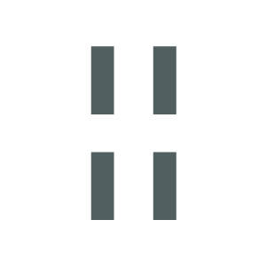 Room set up with individual tables spread out for group work