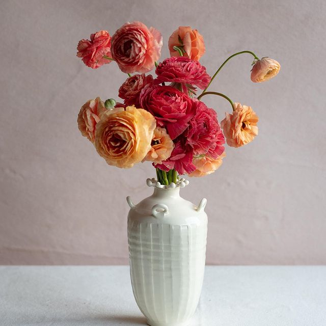 image of one of Frances' Palmer's unique vases with the flowers that she grows