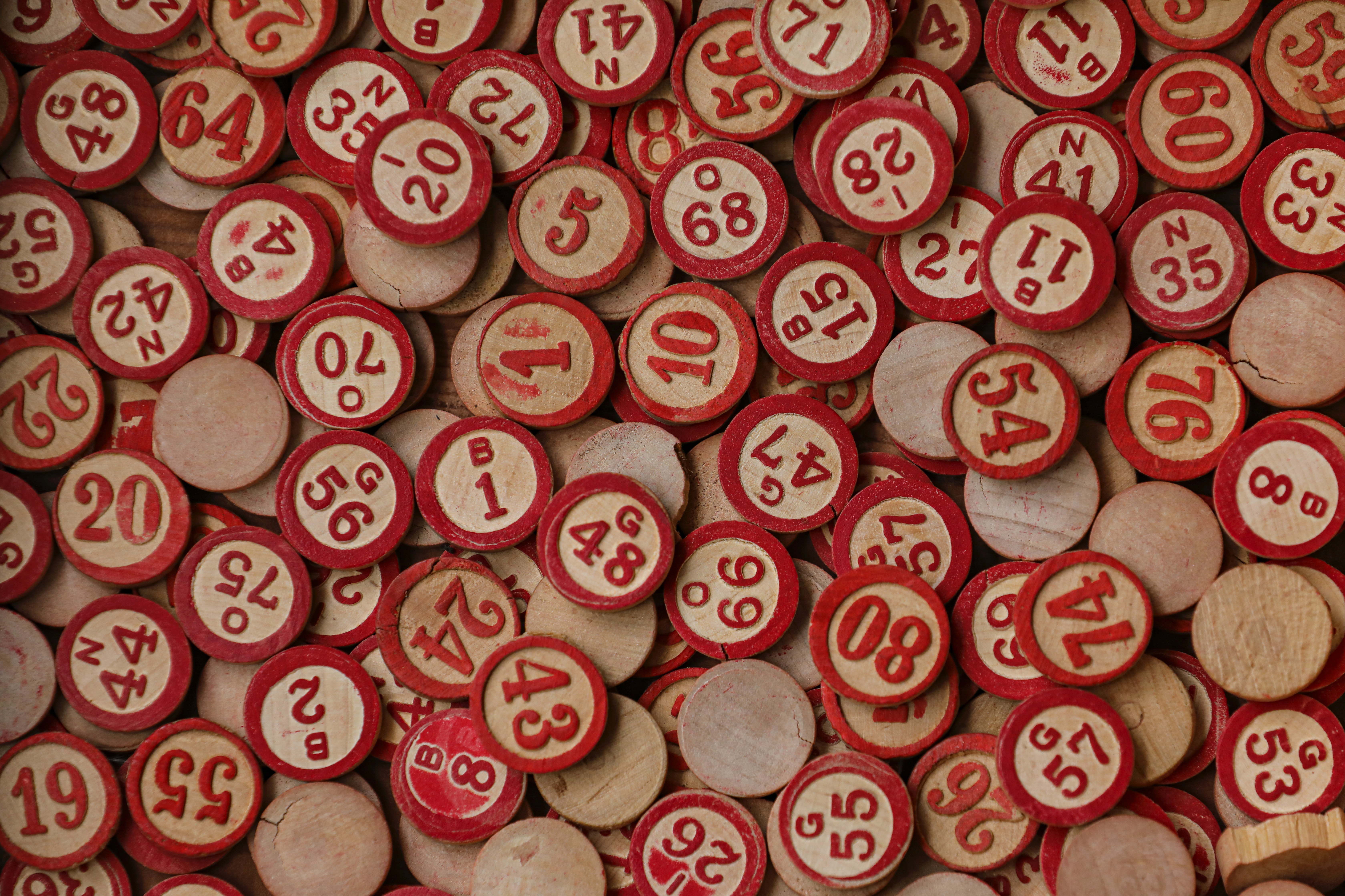 image of a bunch of red and tan bingo chips