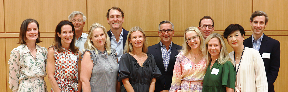 A group of people looking at the camera