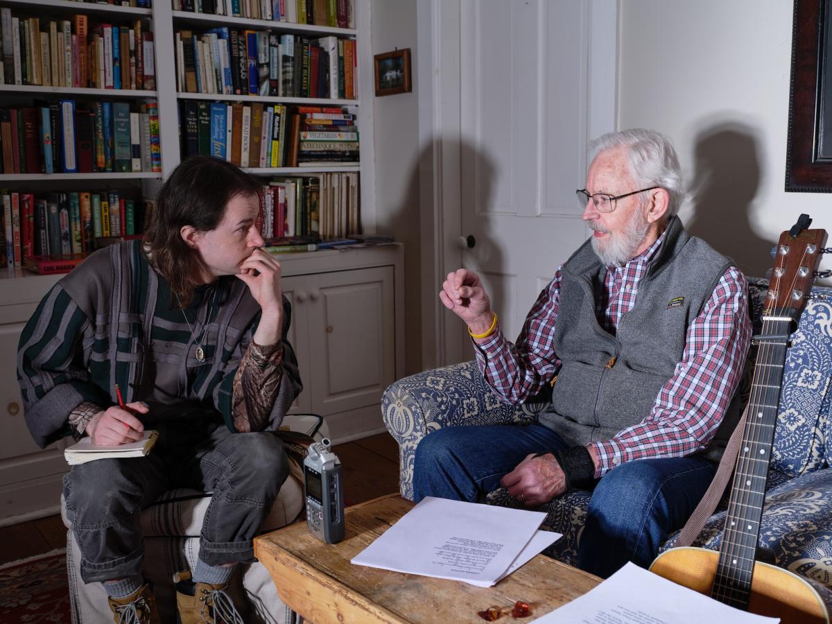 Derek Piotr interviewing man 